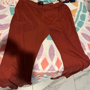 Bell bottom Selena like Nylon pants, thin material